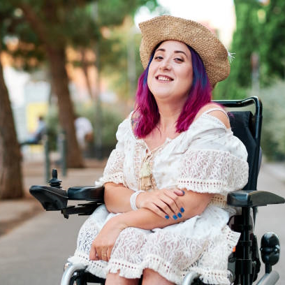 portrait of adult woman with disabiliites looking at camera